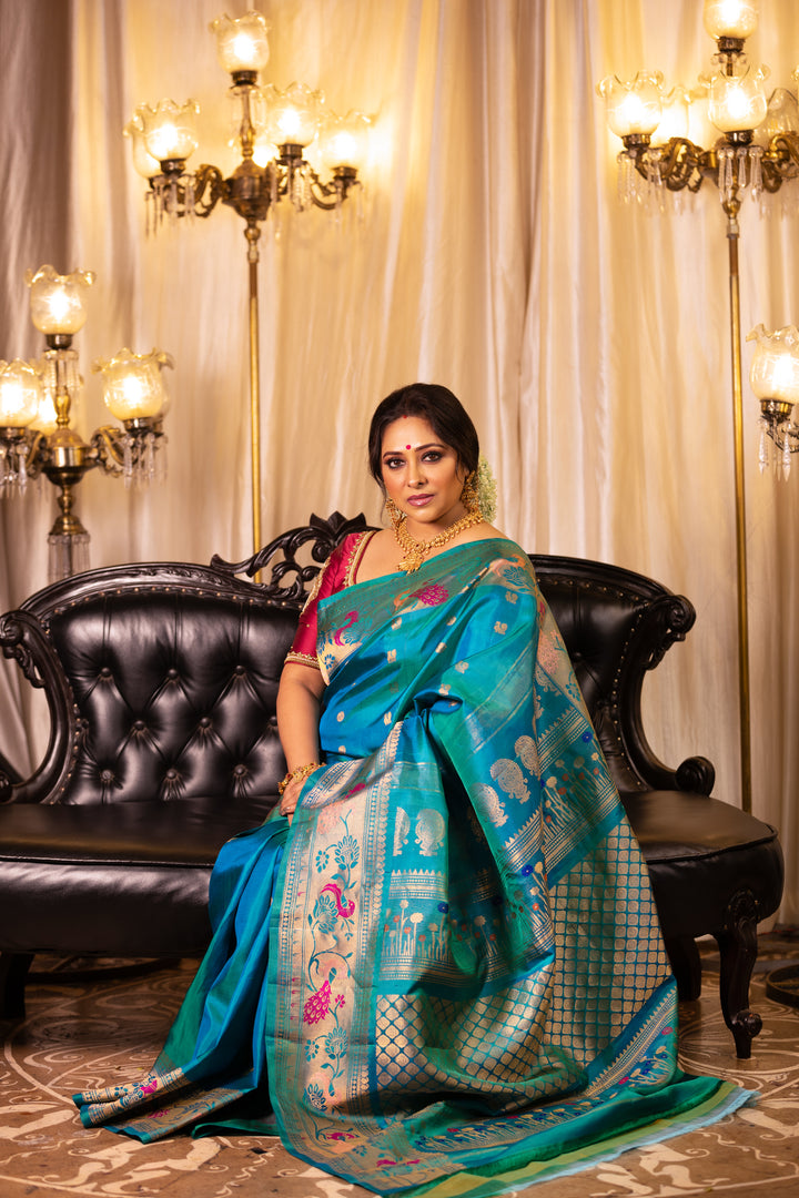 Teal Opulence: The Brocade of Royal Celebrations
